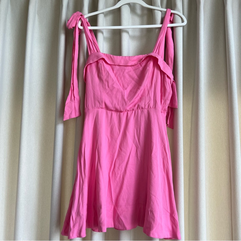 Francesca’s pink mini bow dress